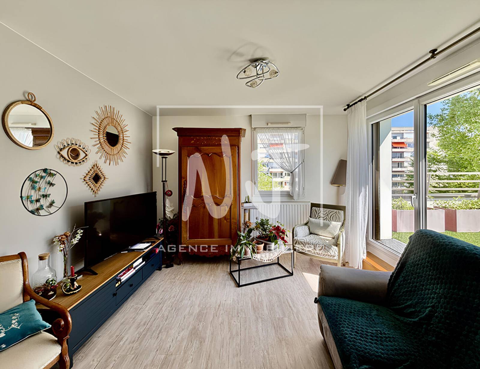 Appartement lumineux avec terrasse, garage et résidence sécurisée récente
